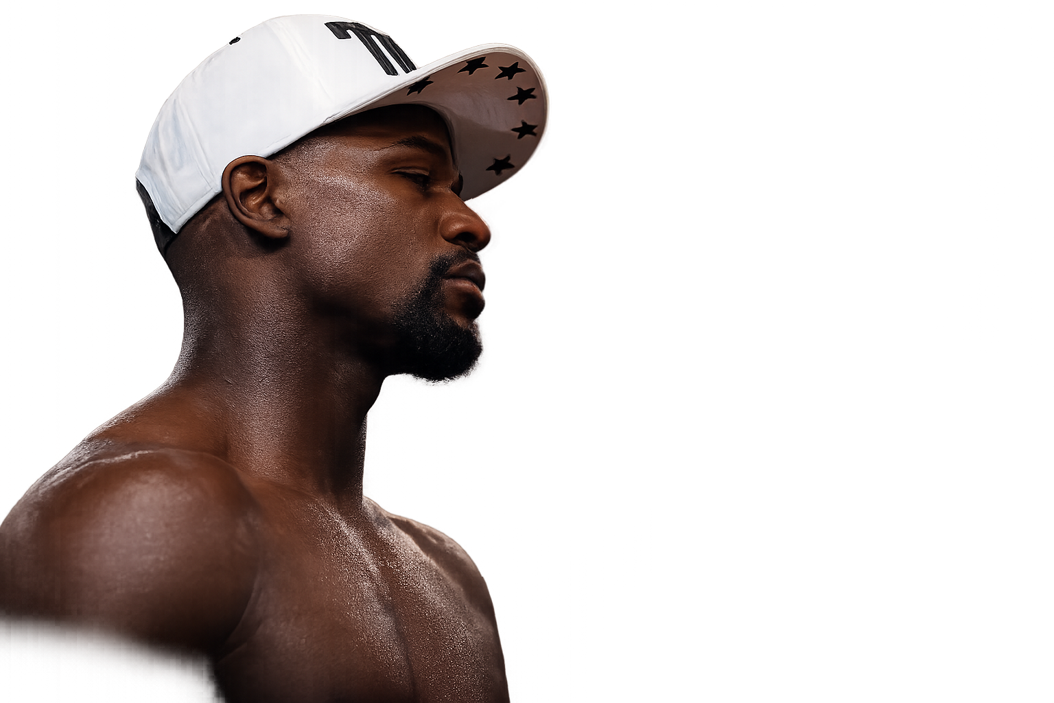 Fighter wearing a white cap, facing off